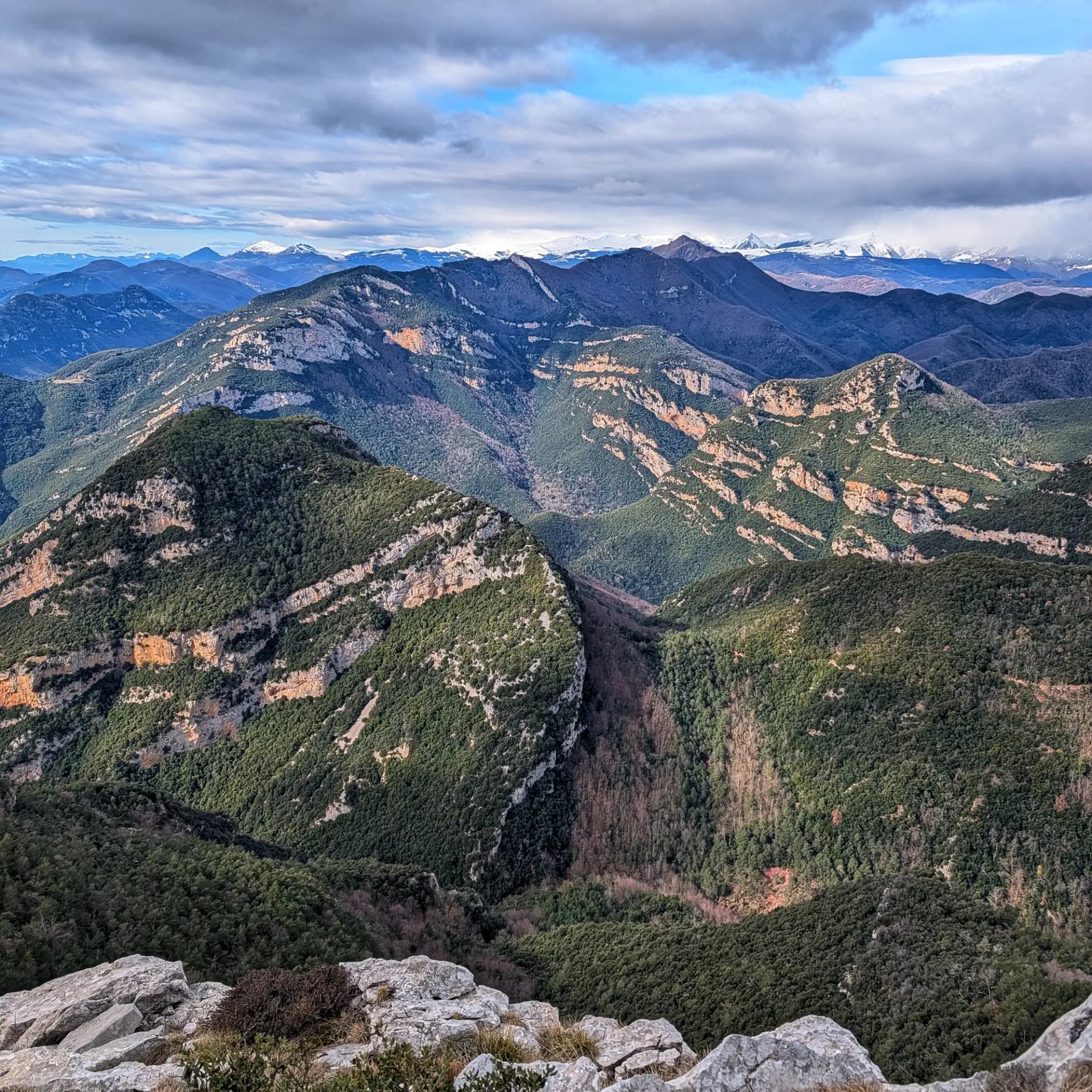 Panoramic views of Alta Garrotxa with Comanegra mountain in the background, taken during descent from Bassegoda.