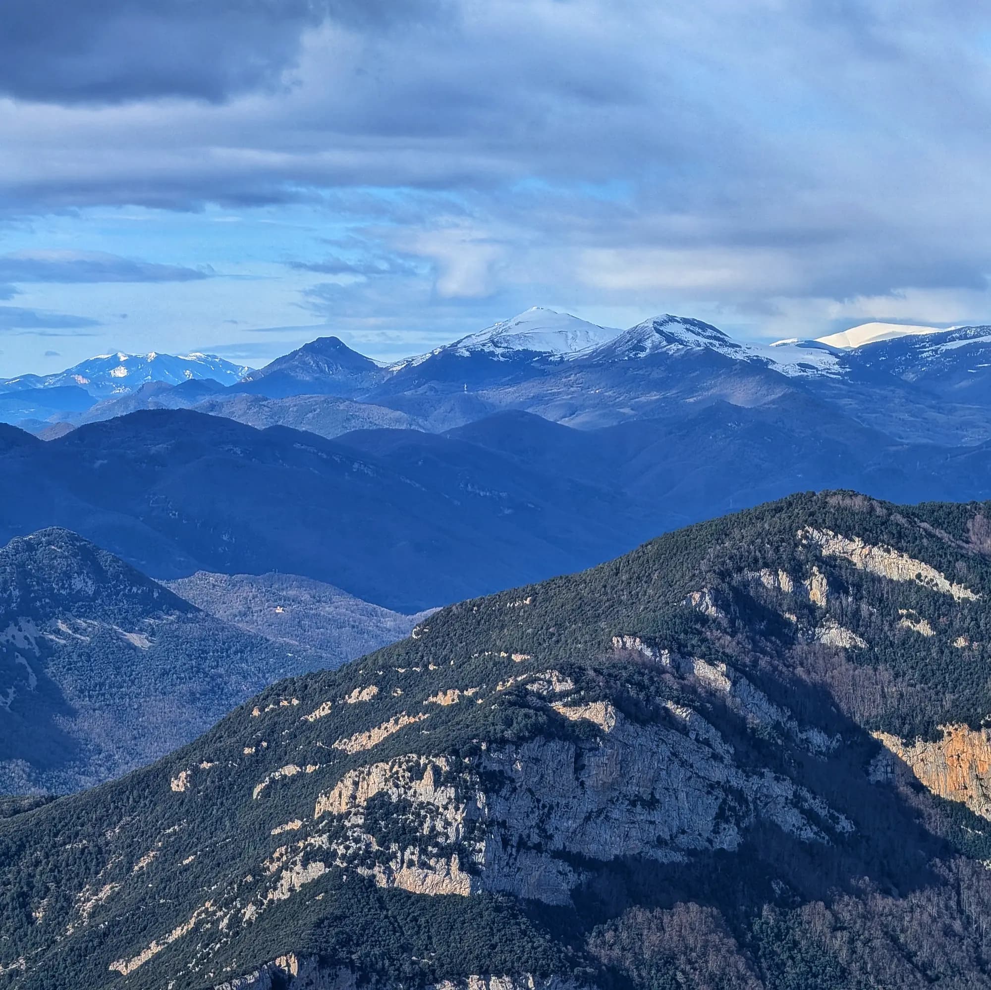 Views of Puig Estela and Puigllançada from the summit of Bassegoda.