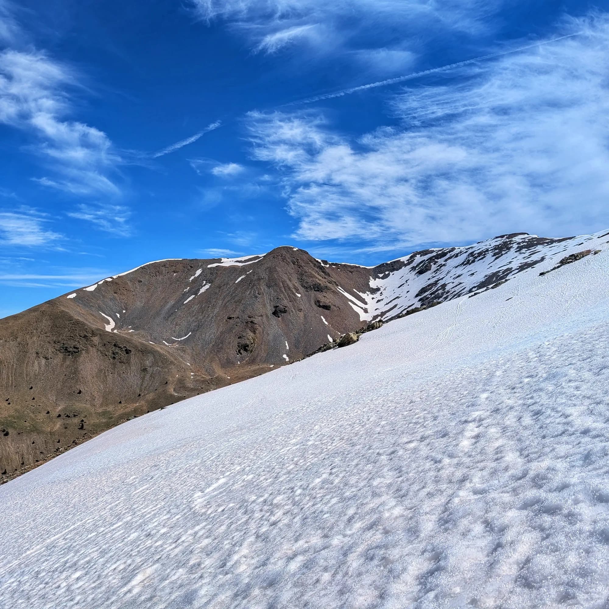 Views of Puigmal de Llo and Pic Petit de Segre separated by the Pas de Llo