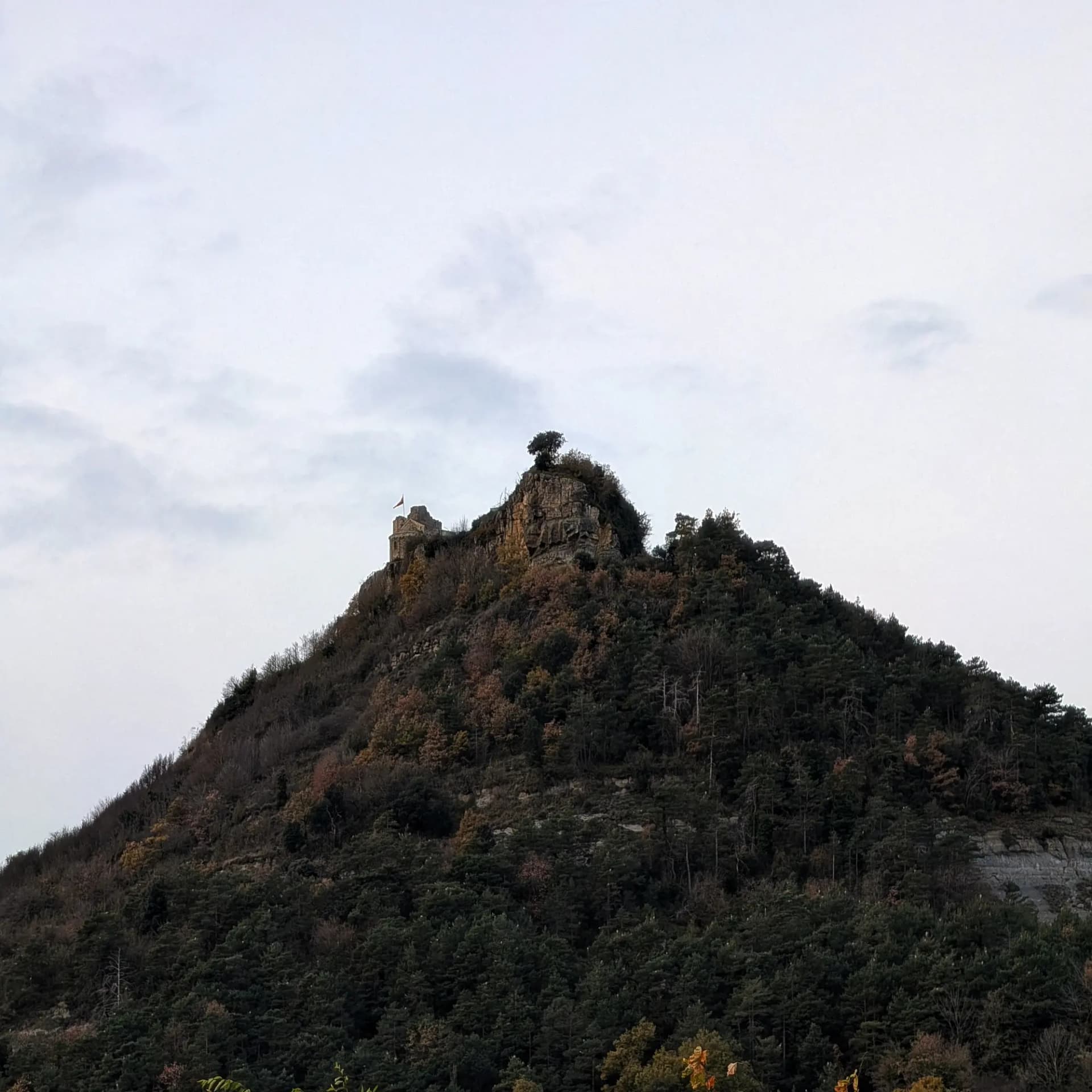 View of Besora Castle from the town of Santa Maria de Besora. Besora Castle, seen from Santa Maria de Besora.